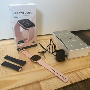 fitbit versa 2 Smartwatch Copper Rose Petal and Navy band options. Like New.